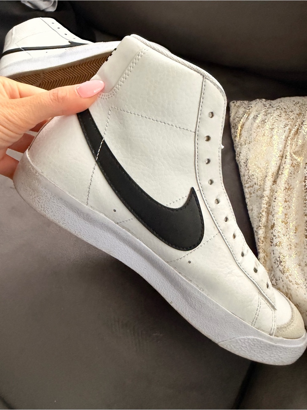 Nike Women’s White High-Top Sneakers with Black Swoosh